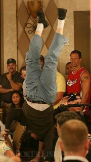 A Player Does a Handstand
